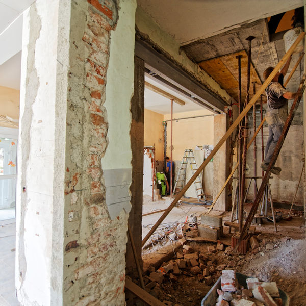 Fire-damaged interior area during structural remediation